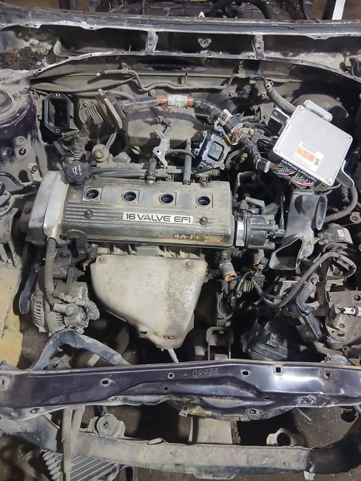 Запчасти Тойота Карина Е