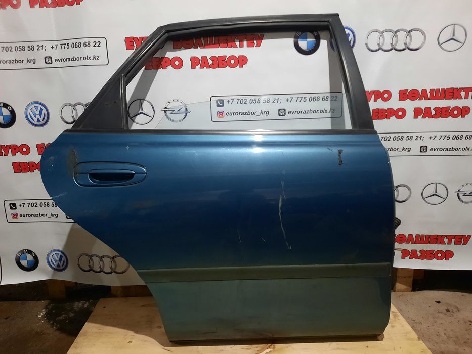 Двери на Мазду Кронос