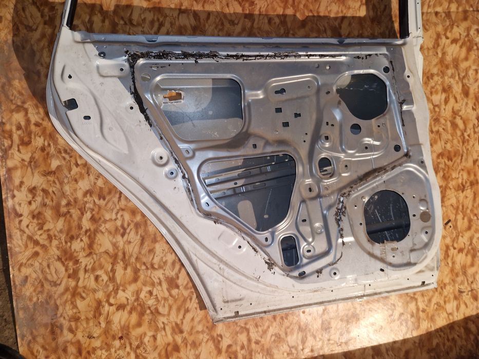 Дверь ниссан альмера