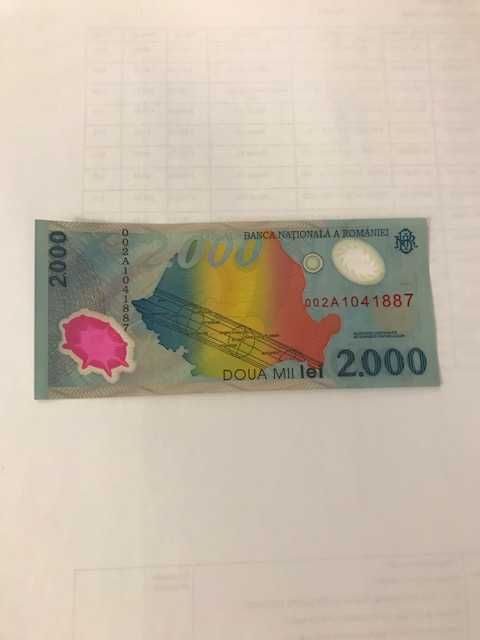 Bancnote de 2000 lei cu eclipsa 1999