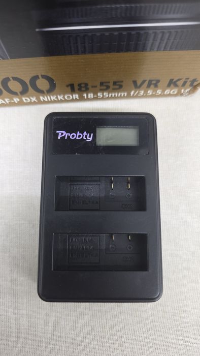 Nikon D5600 + 4 obiective , 2 acumulatori , genata + rucsac