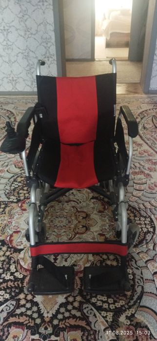 Электрическая инвалидная коляска
