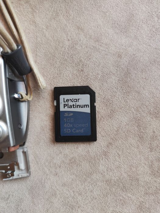Canon Ixus 750 + зарядно и карта