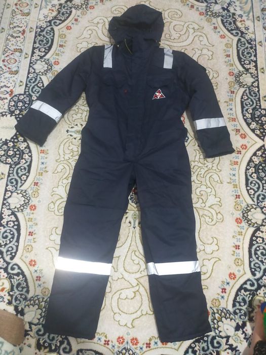 Продам новый комбинезон зимний