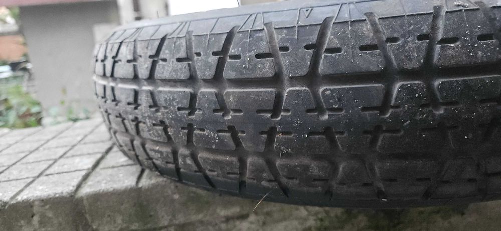 Резервна гума тип "патерица" от Нисан Примера Р11.