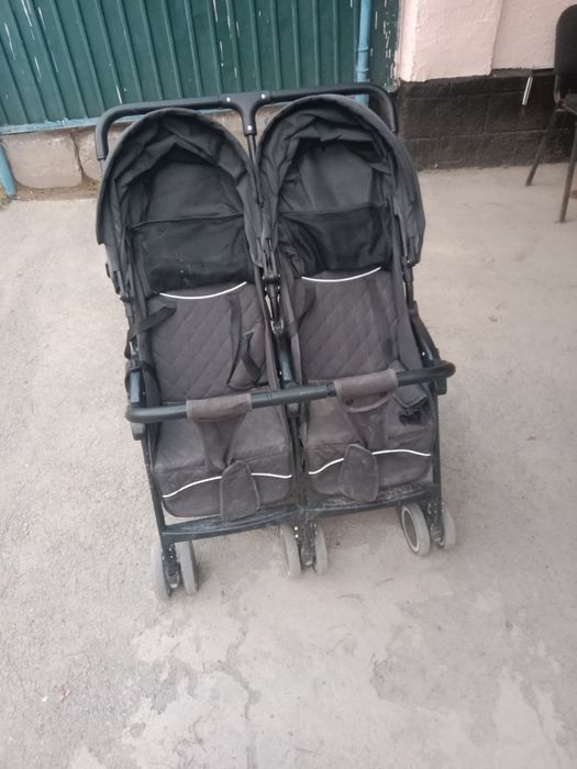 Коляска двухместная