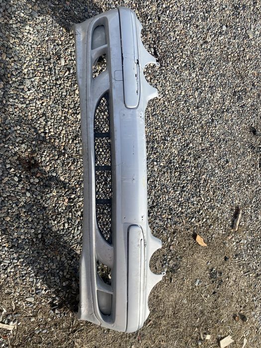 Передний бампер на мерс W210