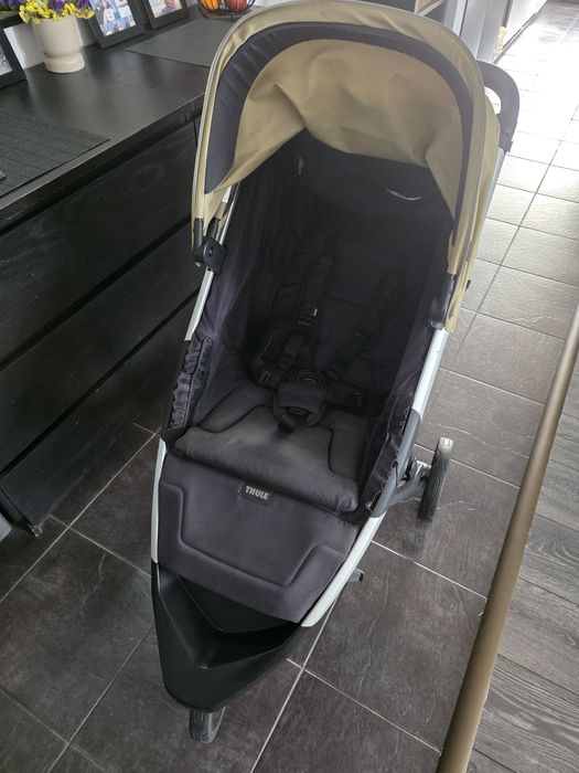 Carucior pliabil Thule Spring bej, cu suspensie, roti din spuma
