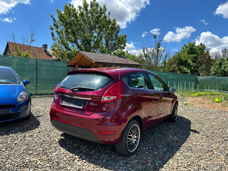 Ford Fiesta Titanium an 2009 pe Acte/ 1.6tdi-90cp/Navi/Climă/Adus Recent!