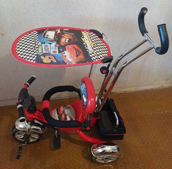 Детский велосипед с ручкой для управления б/у