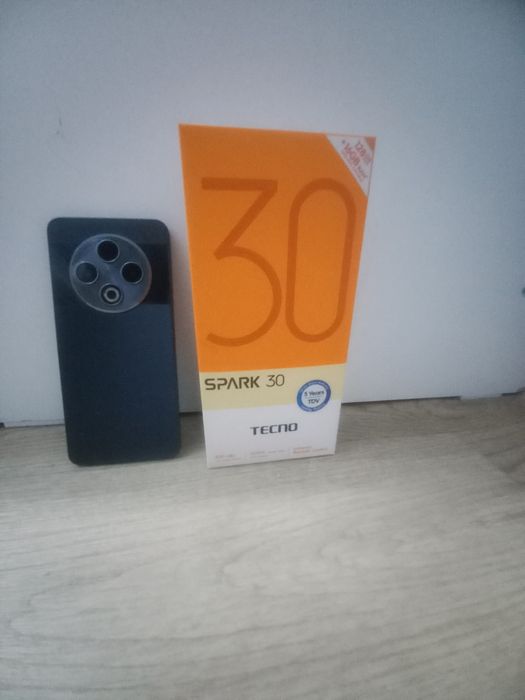 Телефон.SPARK 30 .