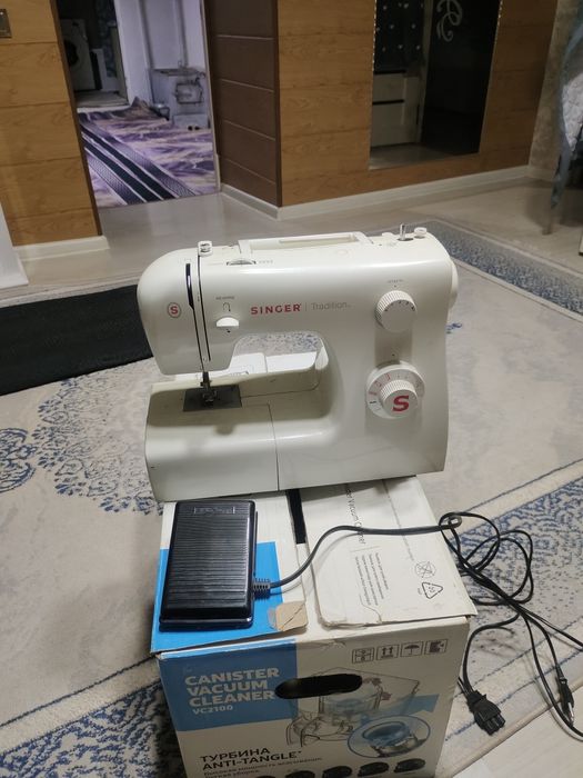 Швейная машина Зингер