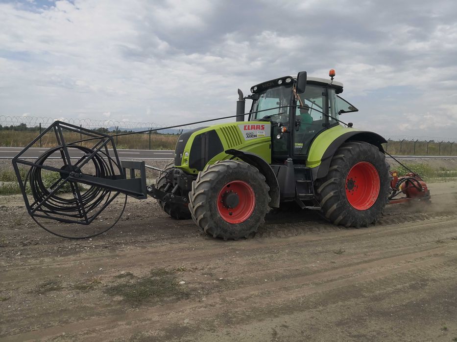 Inchiriere Tractor Cassa Axion Vario cu atasamente plug vibrator si trencher Ditch Witch
