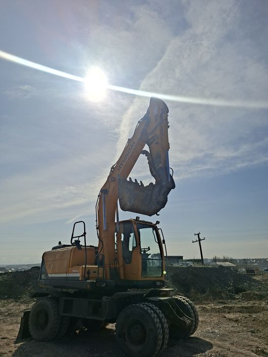 140+145 колеснои экскаватор