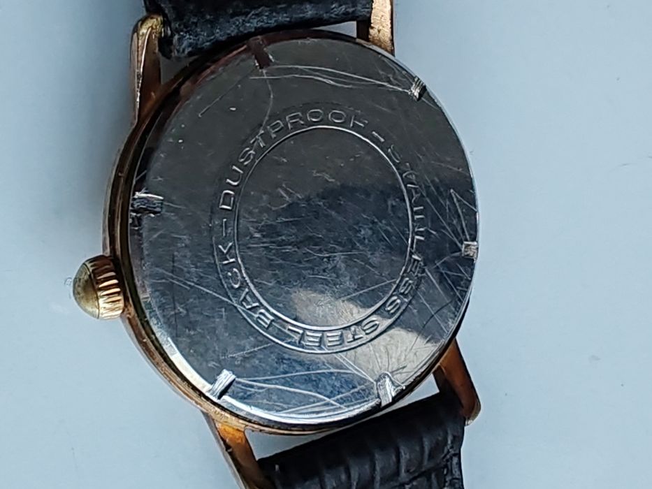 Ceas Herma Placat cu aur Int. Manuala Funcționează excelent!