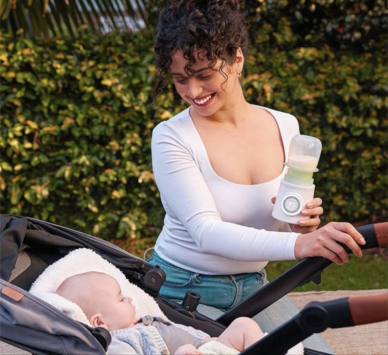 Нагревател за бебешки шишета Momcozy.