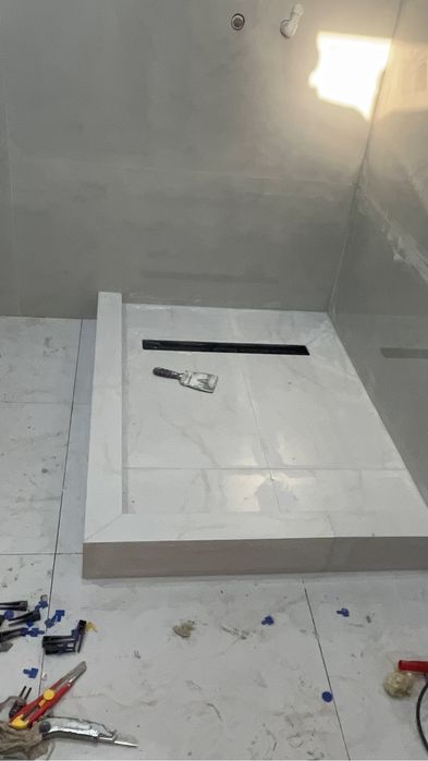 Опытный кафельщик