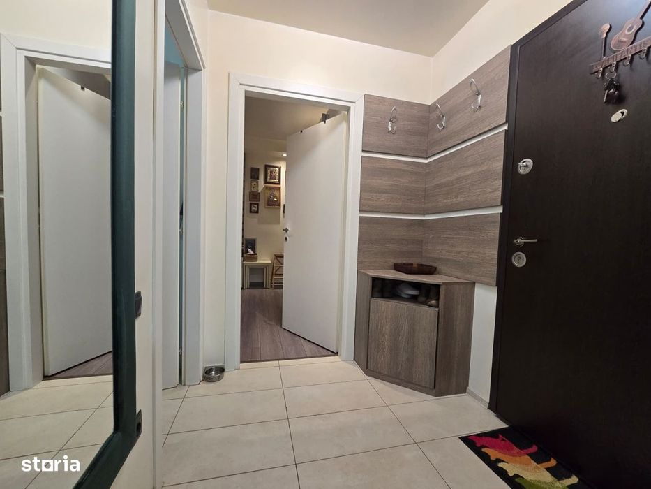COSMOPOLIS - Apartament cu 2 camere si gradina, mobilat si utilat.