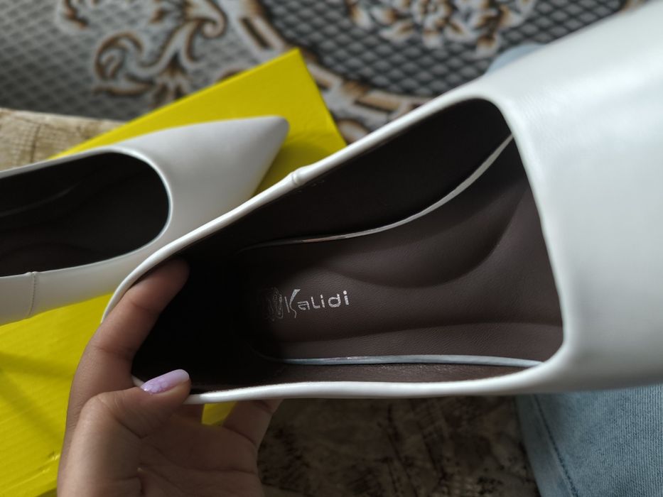 Белые туфли лодочки