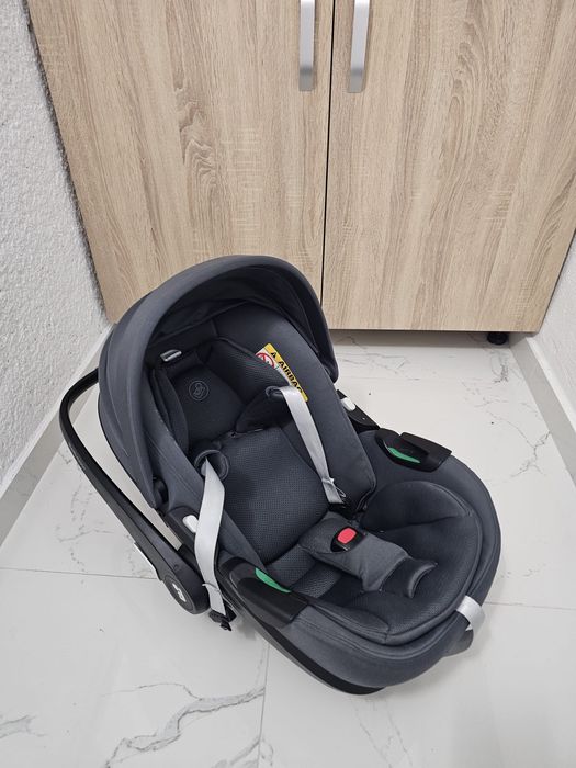 Scaun auto tip scoică pentru copii Maxi Cosi