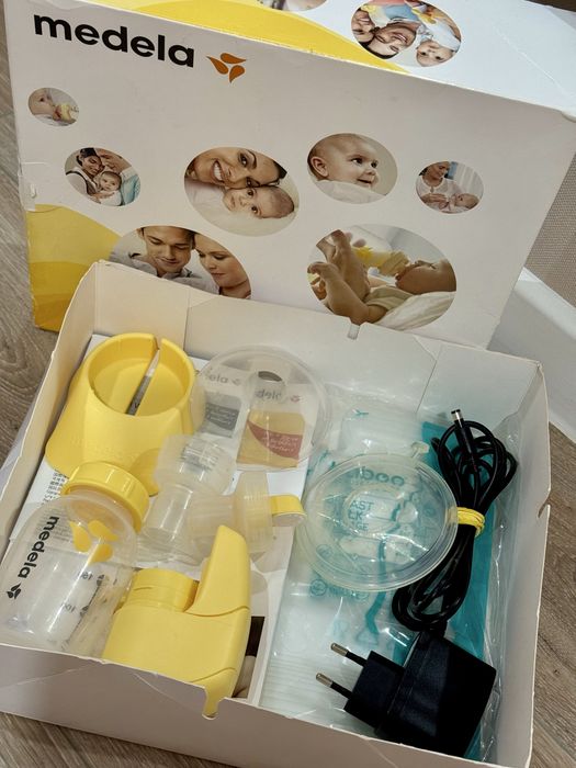 Электрический молокоотсос MEDELA
