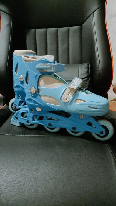 Продам  роликовые коньки б / у.