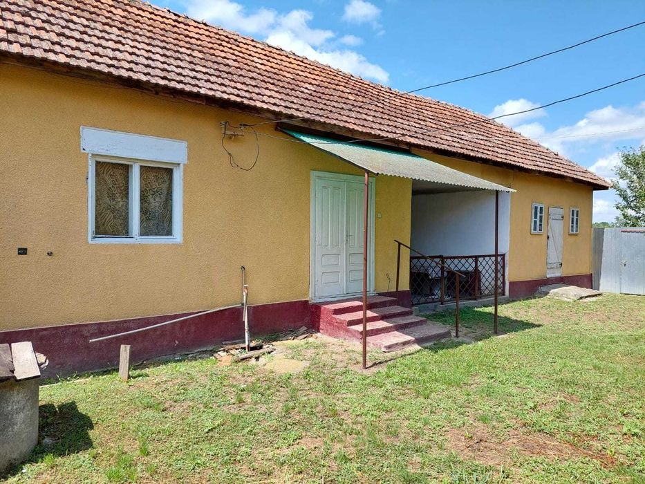 Vând teren pentru casă sau teren cu una sau două case în comuna Bocsig, județul Arad
