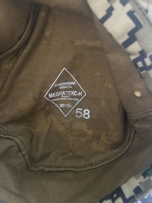 Комуфлированная кепка