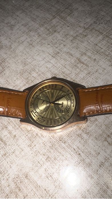 Золотые часы ника