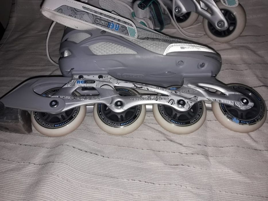 Роликовые коньки