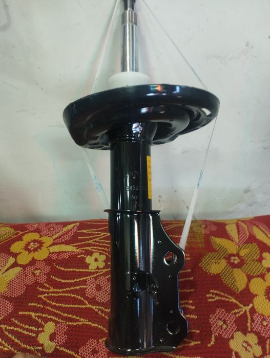 Малибу 2 амортизатор ,передний левый