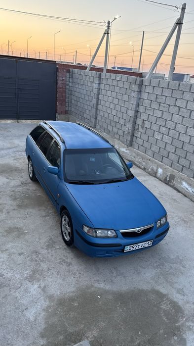 Мазда 626 птичка