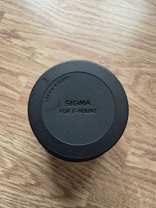 Обектив Sigma 56mm F1.4 Sony E-mount + филтър Walimex Pro Slim MC UV 55mm  | Перфектно състояние