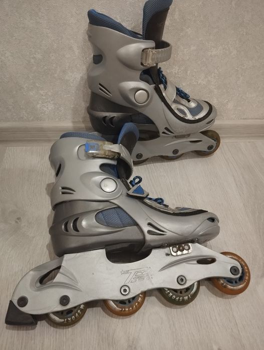 Роликовые коньки