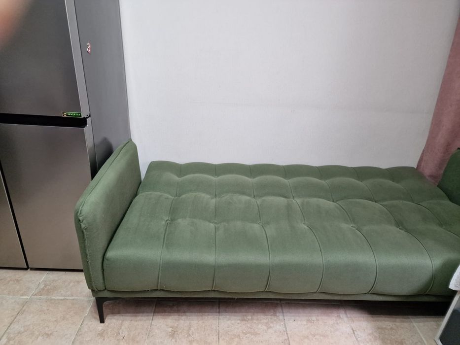 Продам диван книжка б/у зеленый
