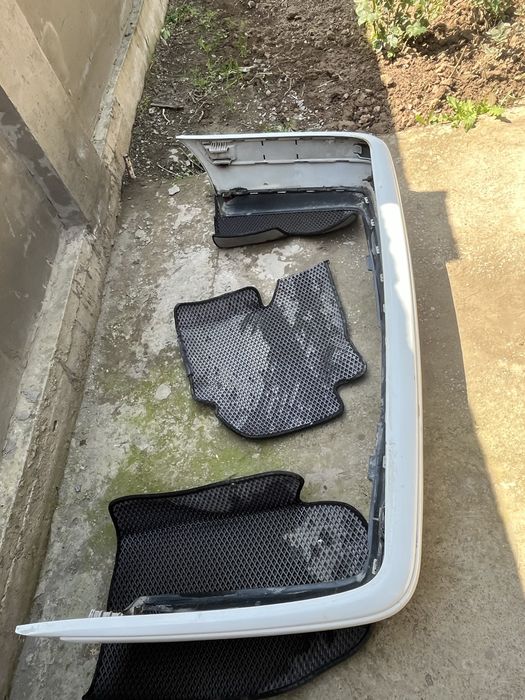 Оригинал бампер 210 до рест