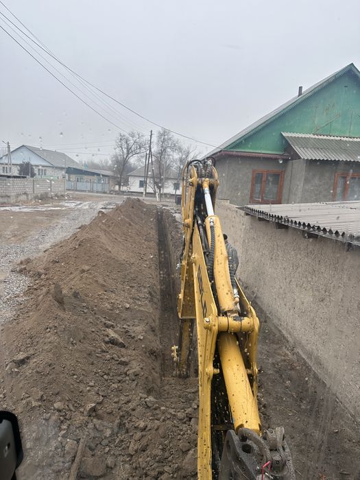 Услуги Экскаватора погрузчика