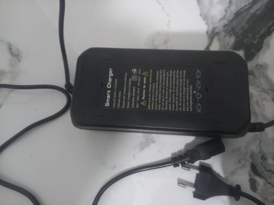 Продам зарядку для электраскутера