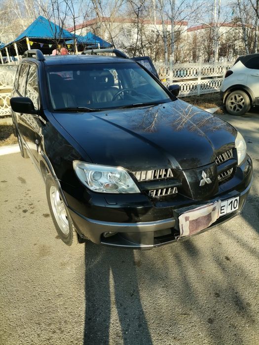 Мицубиси аутлендер 2005 год выпуска