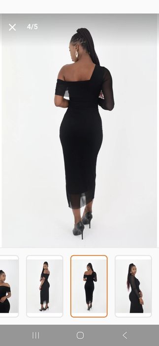 Вталена  рокля с асиметрични ръкави с тюл