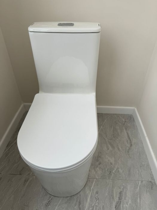 Продам новый унитаз и сместитель для душа