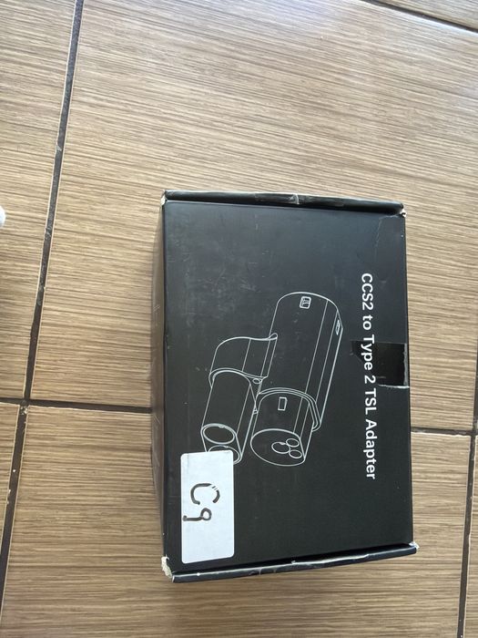 Acesta este un adaptor de incarcare pt vehicule electrice conceput pt a converti o mufa CCS2 intr-un convertor Type 2 compatibil  cu Tesla
