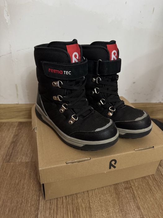 Продам детские сапоги Reima