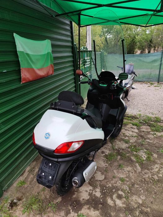 Пиаджо МП3 Piaggio MP3 300 кубика