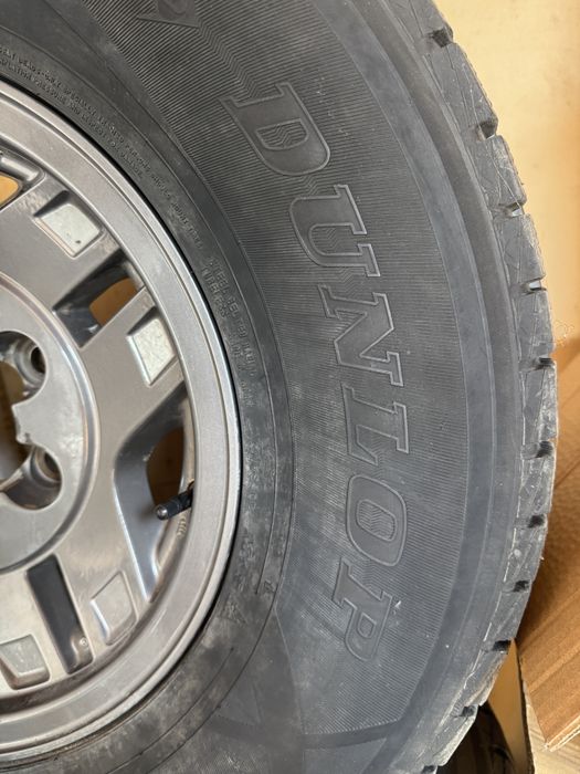 Продам зимние шины с дисками 31’ 265/70/R15