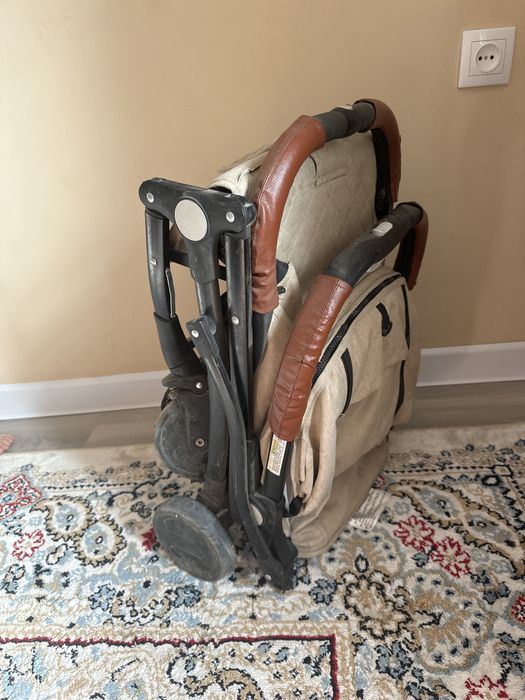 Қолданылған жиналмалы коляска