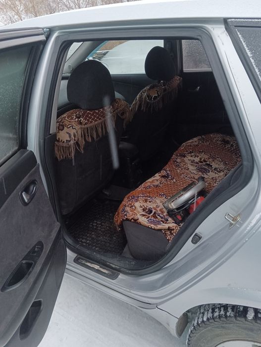 Ниссан примьера р12 2002г.