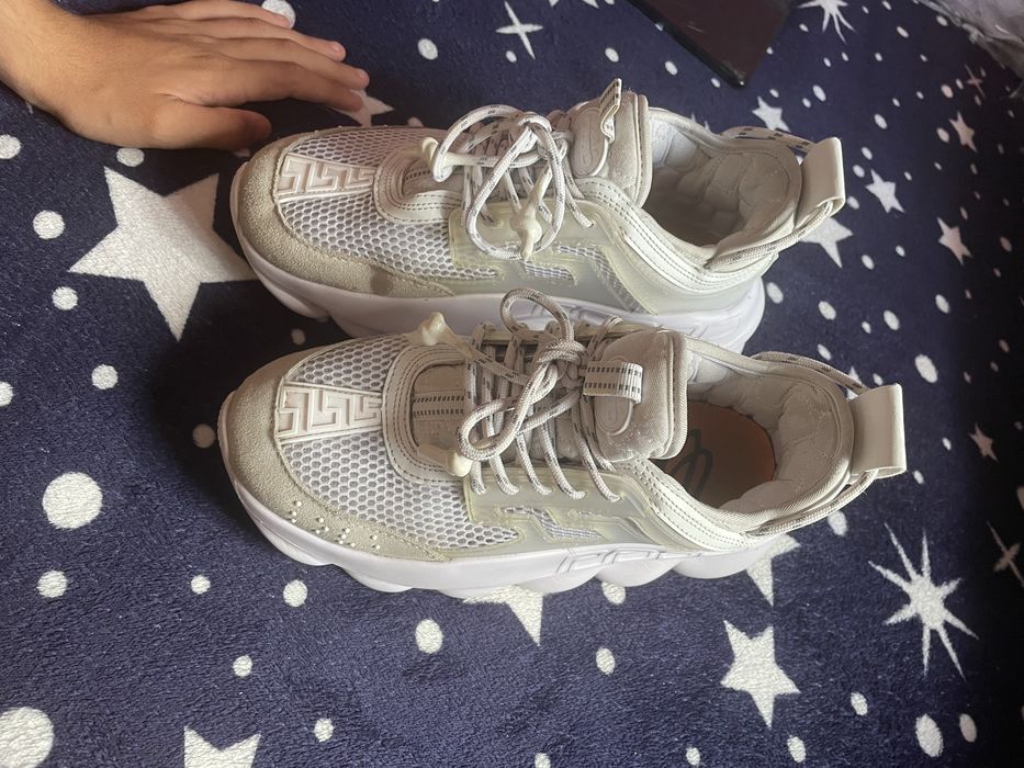 Versace chain reaction