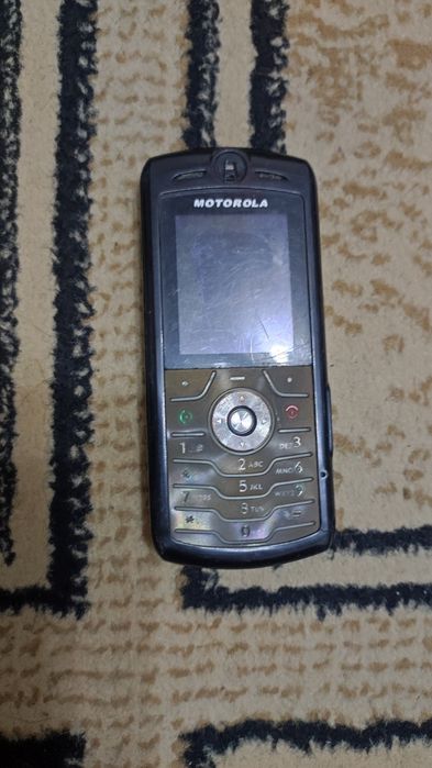 Моторолла телефон.