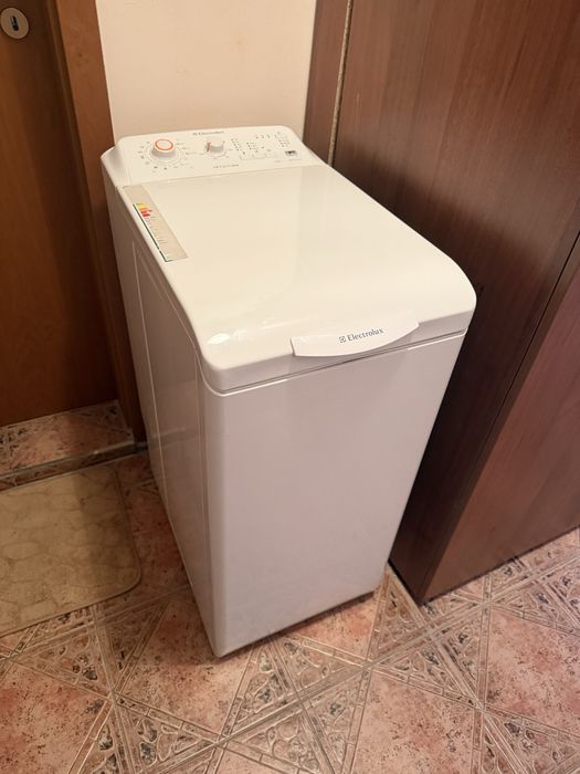 Пералня с горно зареждане